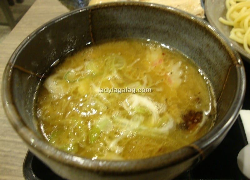 The dipping sauce of Marutoku Tsukemen in Mitsuyado Seimen, a restaurant in Jupiter Street