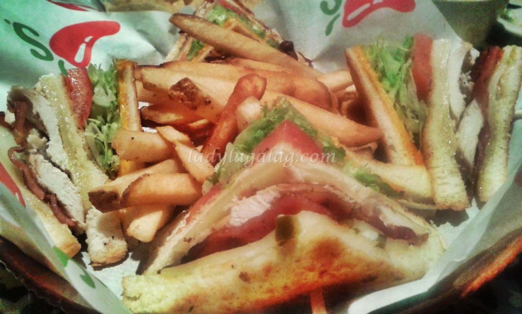 A sports bar and restaurant in Tomas Morato serves Cajun Club Sandwich good for 6!