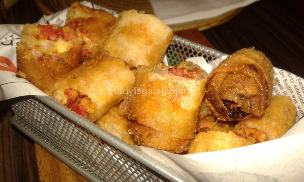 a restaurant in Greenbelt that cooks delicious macau chorizo and cheese tidbits