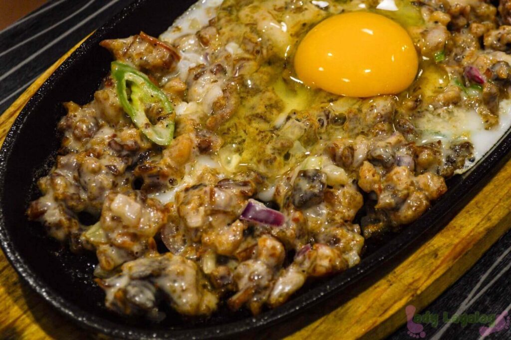 Bagneto, a restaurant in Malingap, does not only serve purely from a rice molded dish. They also have this sisig served in plate!