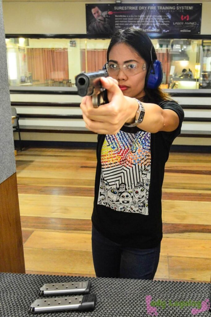 Fun indoor activities in Manila: Learning the right posture when shooting here at Stronghand Shooting Range