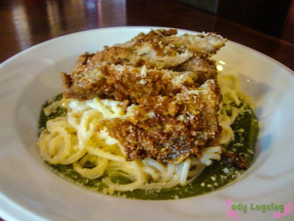 The chicken parmigiana of this restaurant in McKinley surprised us with green sauce.