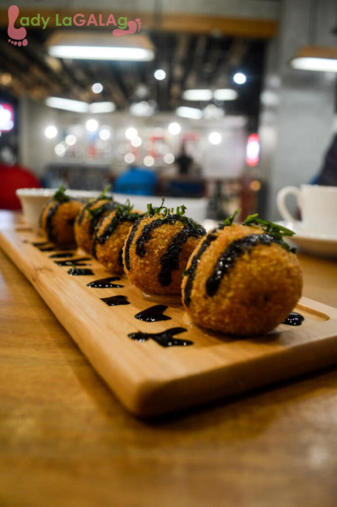 Szechuan shrimp balls of One Plus Coffee, a restaurant in Circuit