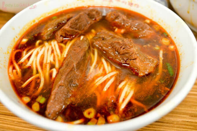 Come experience the spicy beef noodle when you dine in at a restaurant in Taipei